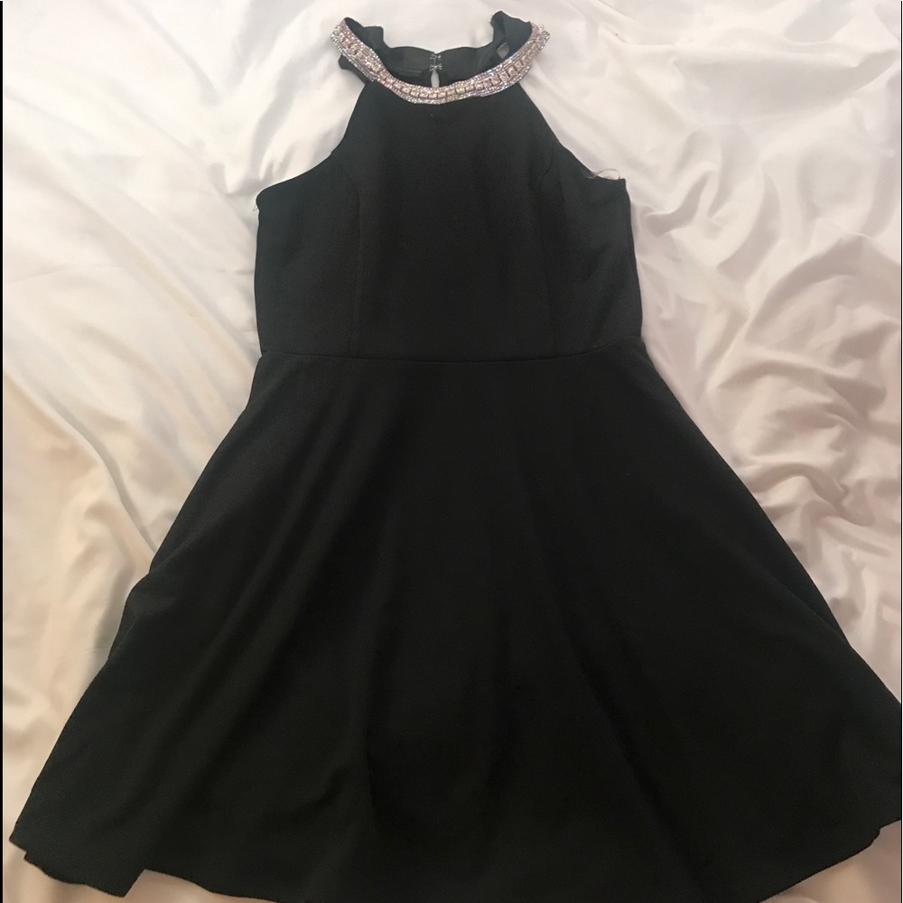 Black dress with jewel neckline